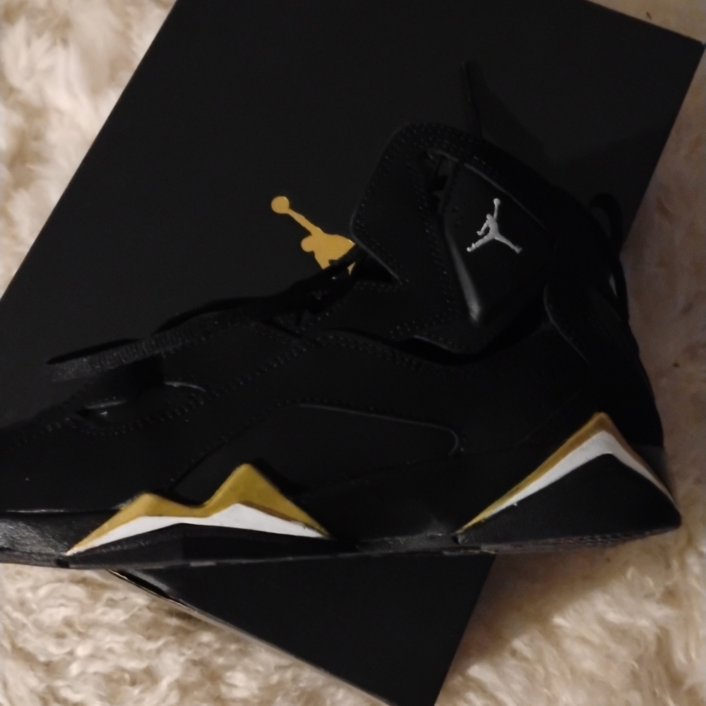 Black and Gold Air Jordan Sneakers